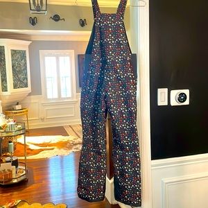 Artic girls (age 10-12) size large snow bid, never worn. Like new condition.